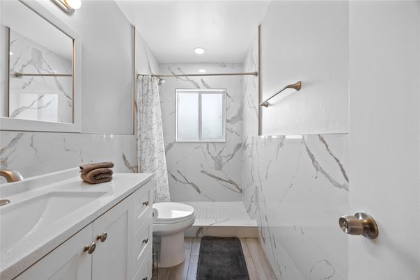 Bathroom, Interior, Marble Walls, Recessed Lighting, Wood Texture Flooring