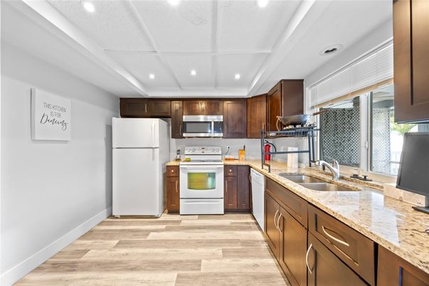 Interior, Kitchen, Recessed Lighting, Stainless Steel Appliances, Wood Texture Flooring