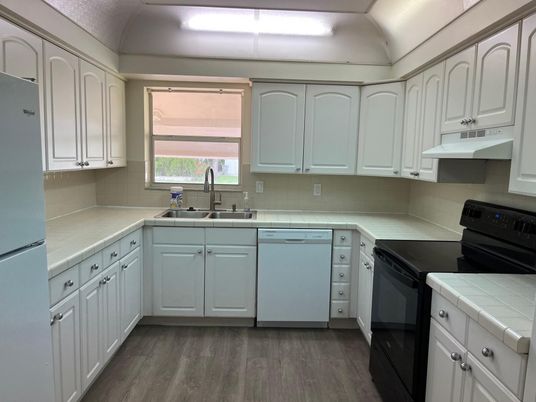 Interior, Kitchen, Tile Countertops, Wood Texture Flooring