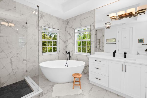 Bathroom, Dual Sink Vanities, Free Standing Baths, Glass Shower, Interior, Marble, Marble Walls, Pendant Lights