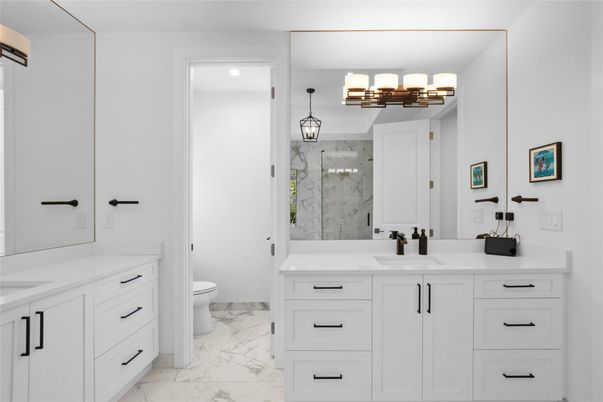 Bathroom, Dual Sink Vanities, Interior, Marble, Marble Walls, Pendant Lights
