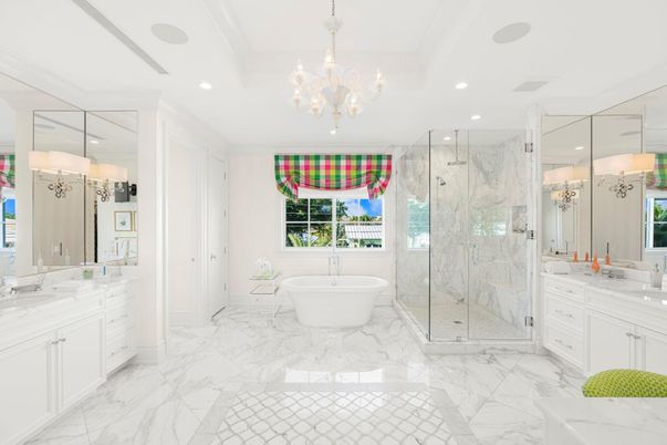 Bathroom, Chandelier, Dual Sink Vanities, Free Standing Baths, Glass Shower, Interior, Marble, Marble Walls, Recessed Lighting
