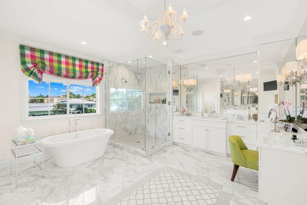 Bathroom, Chandelier, Dual Sink Vanities, Free Standing Baths, Glass Shower, Interior, Marble, Marble Walls, Recessed Lighting
