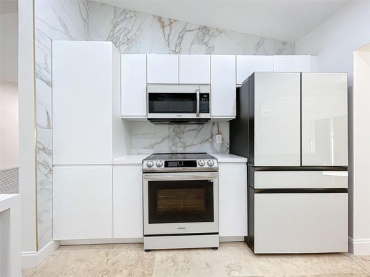 Interior, Kitchen, Marble Walls, Stainless Steel Appliances