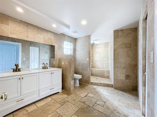 Bathroom, Dual Sink Vanities, Interior, Recessed Lighting, Stone Walls