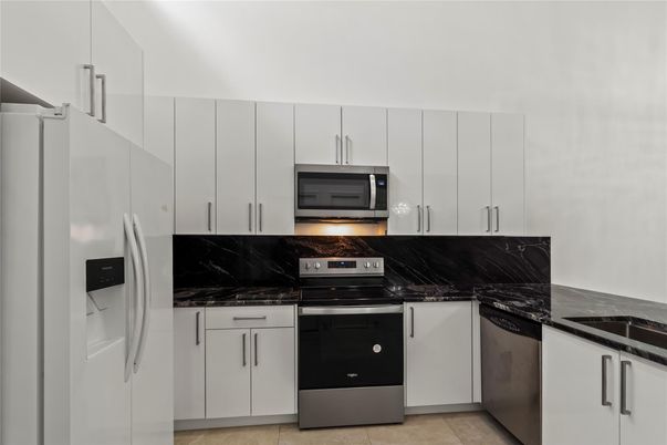 Interior, Kitchen, Marble Walls, Stainless Steel Appliances