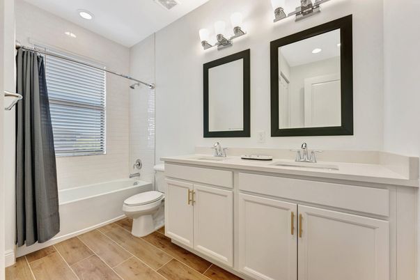 Bathroom, Dual Sink Vanities, Interior, Recessed Lighting, Wood Texture Flooring