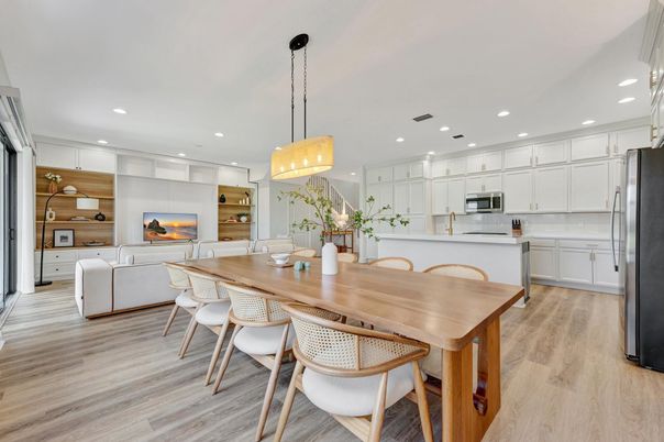 Dining room, Fireplace, Interior, Kitchen, Living room, Pendant Lights, Recessed Lighting, Stainless Steel Appliances, Wood Texture Flooring