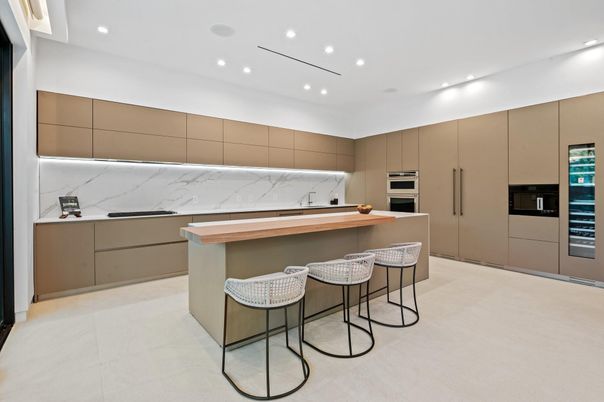 Interior, Kitchen, Marble Walls, Recessed Lighting, Stainless Steel Appliances