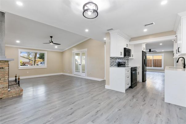 Fireplace, Interior, Kitchen, Recessed Lighting, Wood Texture Flooring