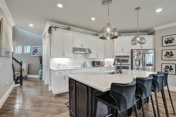 Interior, Kitchen, Pendant Lights, Recessed Lighting, Stainless Steel Appliances, Wood Texture Flooring