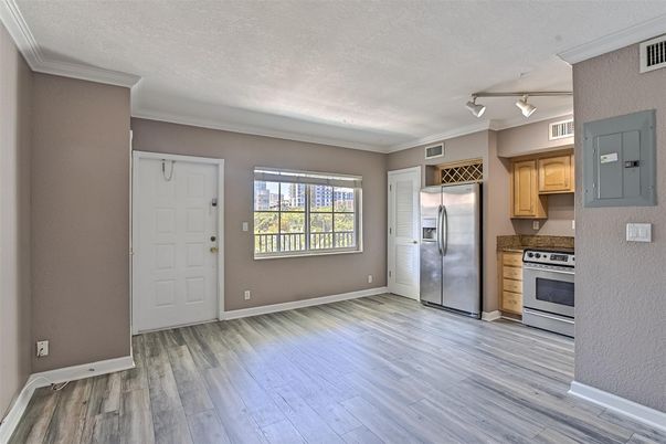 Empty room, Interior, Kitchen, Stainless Steel Appliances, Wood Texture Flooring