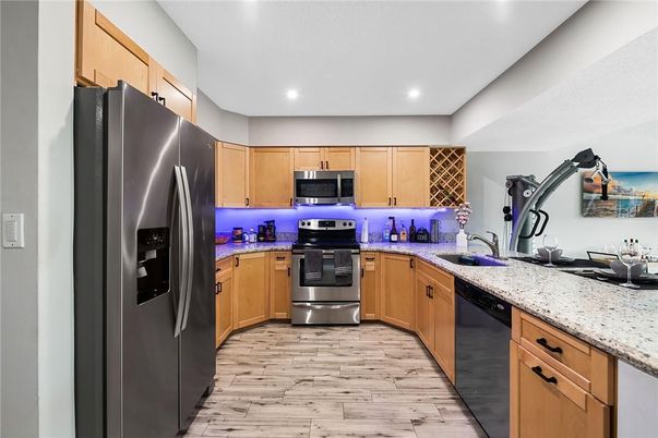 Interior, Kitchen, Recessed Lighting, Stainless Steel Appliances, Wood Texture Flooring