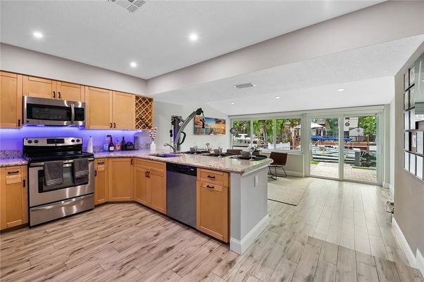 Interior, Kitchen, Recessed Lighting, Stainless Steel Appliances, Wood Texture Flooring