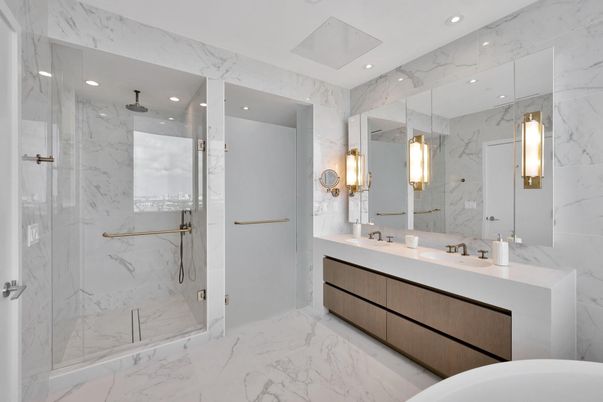 Bathroom, Dual Sink Vanities, Glass Shower, Interior, Marble, Marble Walls, Recessed Lighting