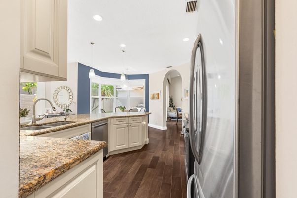 Interior, Kitchen, Pendant Lights, Recessed Lighting, Stainless Steel Appliances, Wood Texture Flooring