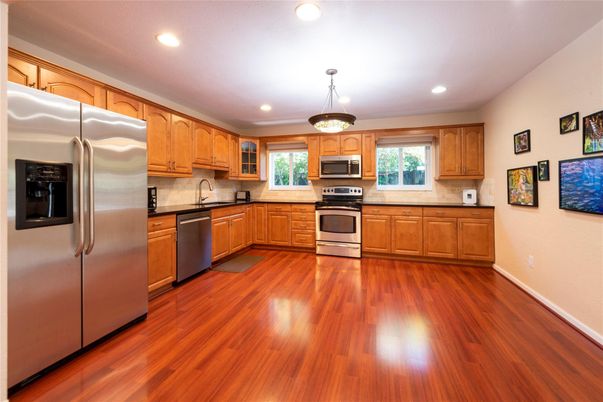 Interior, Kitchen, Pendant Lights, Recessed Lighting, Stainless Steel Appliances, Wood Texture Flooring