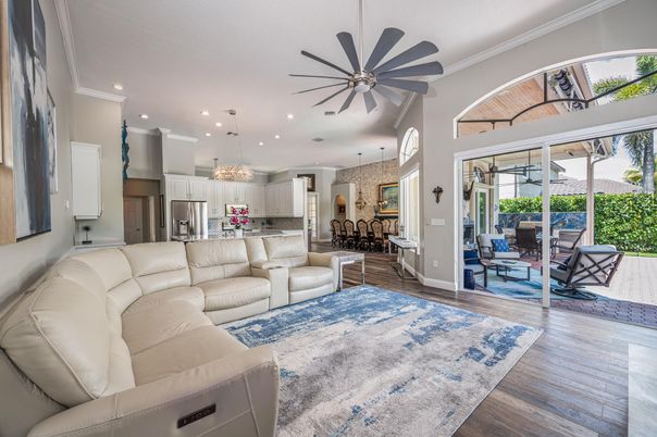 Chandelier, Dining room, Interior, Kitchen, Living room, Pendant Lights, Recessed Lighting, Stainless Steel Appliances, Wood Texture Flooring