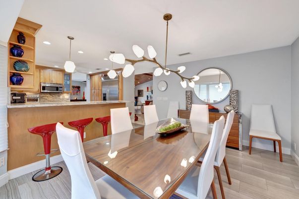 Dining room, Interior, Kitchen, Pendant Lights, Recessed Lighting, Stainless Steel Appliances, Wood Texture Flooring