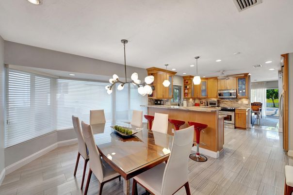Dining room, Interior, Kitchen, Pendant Lights, Recessed Lighting, Stainless Steel Appliances, Wood Texture Flooring