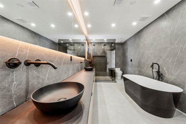 Bathroom, Dual Sink Vanities, Free Standing Baths, Glass Shower, Interior, Marble Walls, Recessed Lighting