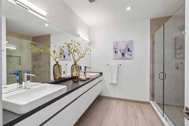 Bathroom, Dual Sink Vanities, Glass Shower, Interior, Recessed Lighting, Wood Texture Flooring