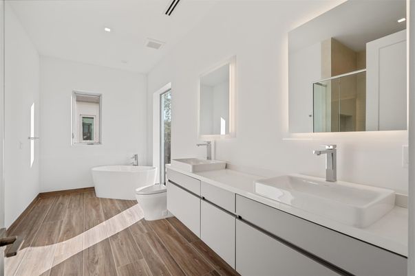 Bathroom, Dual Sink Vanities, Free Standing Baths, Interior, Recessed Lighting, Wood Texture Flooring