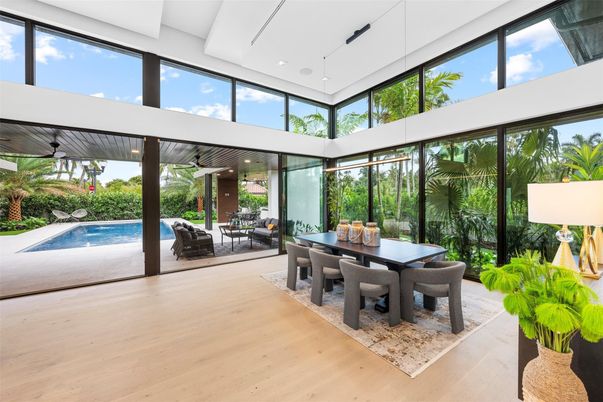 Dining room, Interior, Pool, Sun Room, Wood Texture Flooring