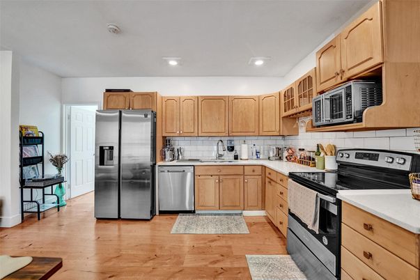 Interior, Kitchen, Recessed Lighting, Stainless Steel Appliances, Wood Texture Flooring