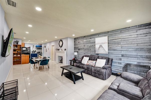 Dining room, Fireplace, Interior, Living room, Recessed Lighting, Stone Walls