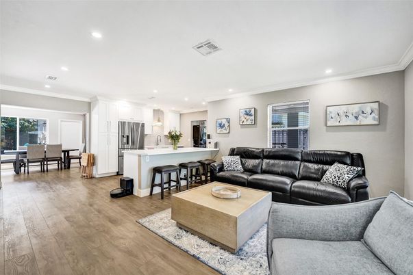 Dining room, Interior, Kitchen, Living room, Recessed Lighting, Stainless Steel Appliances, Wood Texture Flooring