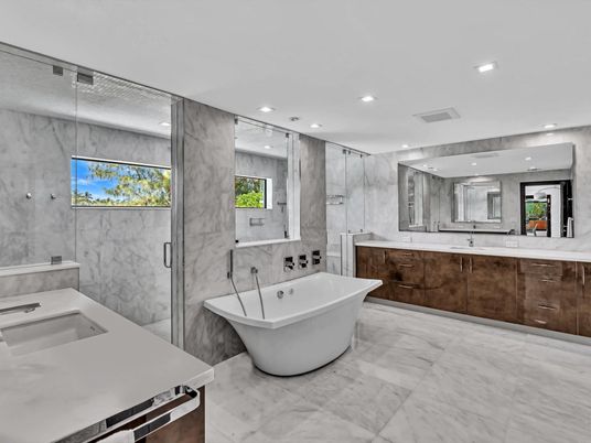 Bathroom, Dual Sink Vanities, Free Standing Baths, Glass Shower, Interior, Marble, Marble Walls, Recessed Lighting