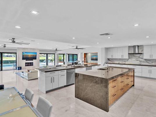Fireplace, Interior, Kitchen, Living room, Marble, Recessed Lighting, Stainless Steel Appliances