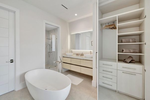 Bathroom, Dual Sink Vanities, Free Standing Baths, Glass Shower, Interior, Recessed Lighting, Walk-in Closets