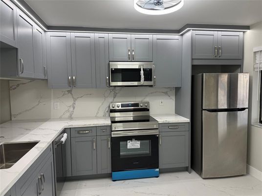 Interior, Kitchen, Marble, Marble Walls, Stainless Steel Appliances