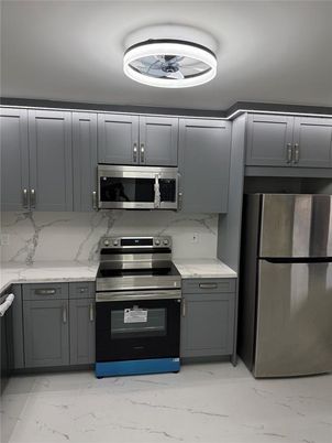Interior, Kitchen, Marble, Marble Walls, Stainless Steel Appliances