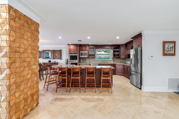 Interior, Kitchen, Recessed Lighting, Stainless Steel Appliances, Stone Walls