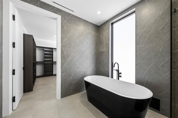 Bathroom, Free Standing Baths, Interior, Marble Walls, Recessed Lighting, Walk-in Closets