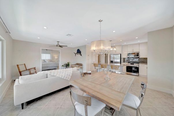 Chandelier, Dining room, Interior, Kitchen, Living room, Pendant Lights, Recessed Lighting, Stainless Steel Appliances