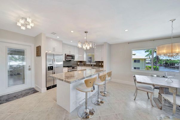 Chandelier, Dining room, Interior, Kitchen, Pendant Lights, Recessed Lighting, Stainless Steel Appliances