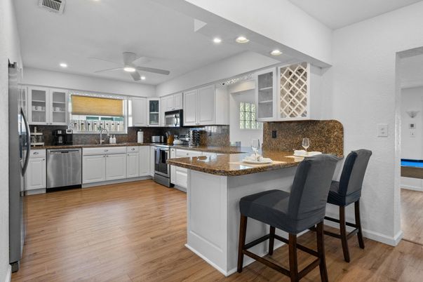 Interior, Kitchen, Recessed Lighting, Stainless Steel Appliances, Wood Texture Flooring