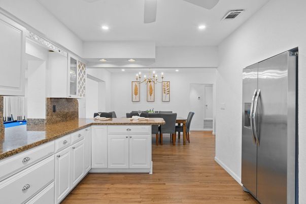Dining room, Interior, Kitchen, Recessed Lighting, Stainless Steel Appliances, Wood Texture Flooring