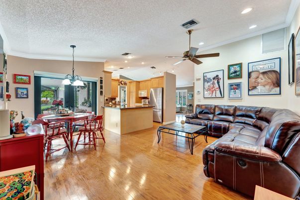 Dining room, Interior, Kitchen, Living room, Pendant Lights, Recessed Lighting, Stainless Steel Appliances, Wood Texture Flooring
