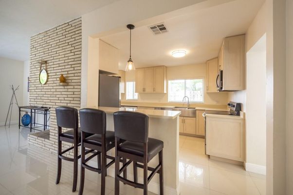 Interior, Kitchen, Pendant Lights, Stainless Steel Appliances, Stone Walls
