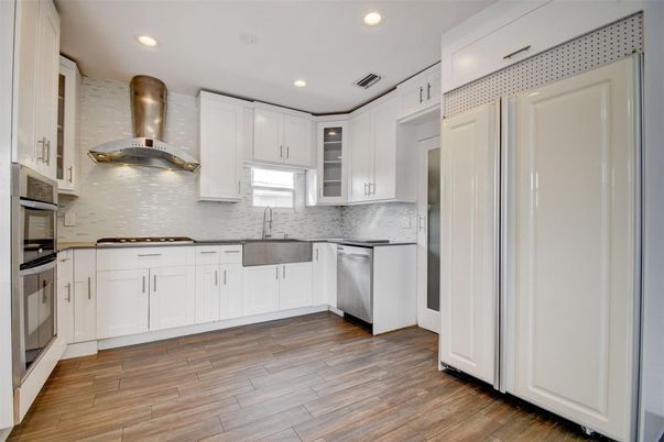 Interior, Kitchen, Recessed Lighting, Stainless Steel Appliances, Wood Texture Flooring