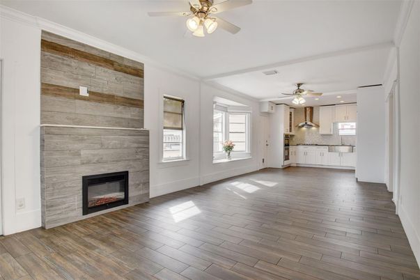 Empty room, Fireplace, Interior, Kitchen, Recessed Lighting, Wood Texture Flooring