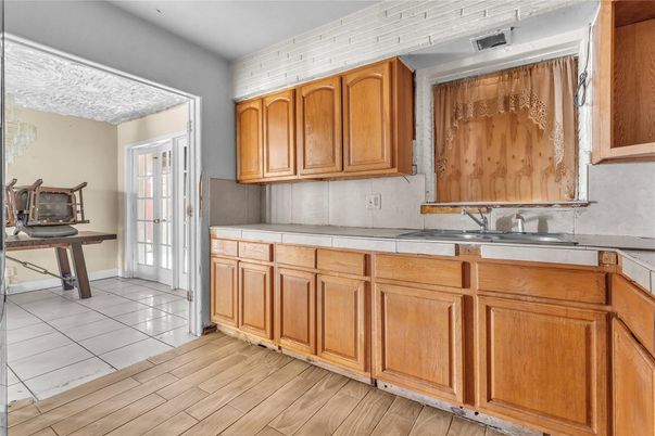 Interior, Kitchen, Tile Countertops, Wood Texture Flooring