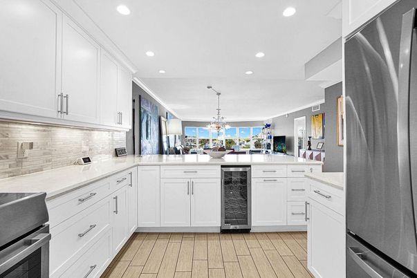 Dining room, Interior, Kitchen, Pendant Lights, Recessed Lighting, Stainless Steel Appliances, Water, Wood Texture Flooring