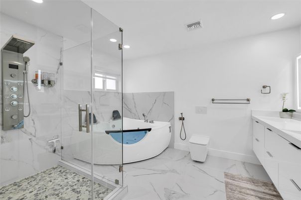 Bathroom, Free Standing Baths, Glass Shower, Interior, Marble, Marble Walls, Recessed Lighting