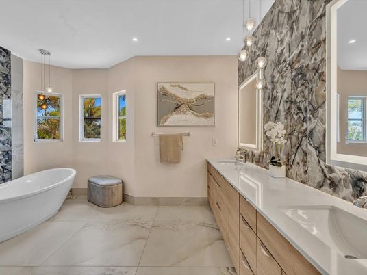 Bathroom, Dual Sink Vanities, Free Standing Baths, Interior, Marble, Pendant Lights, Recessed Lighting